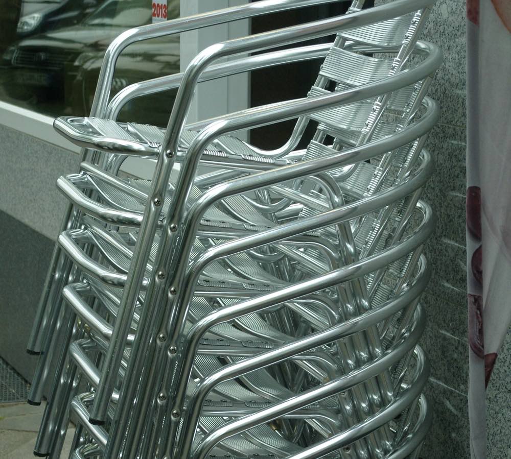 Stack of aluminium chairs