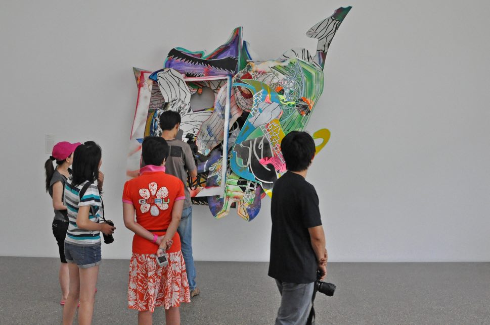Visitors viewing art