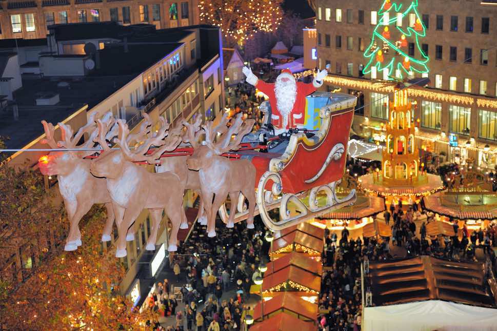 Flying Santa over Christmas Market