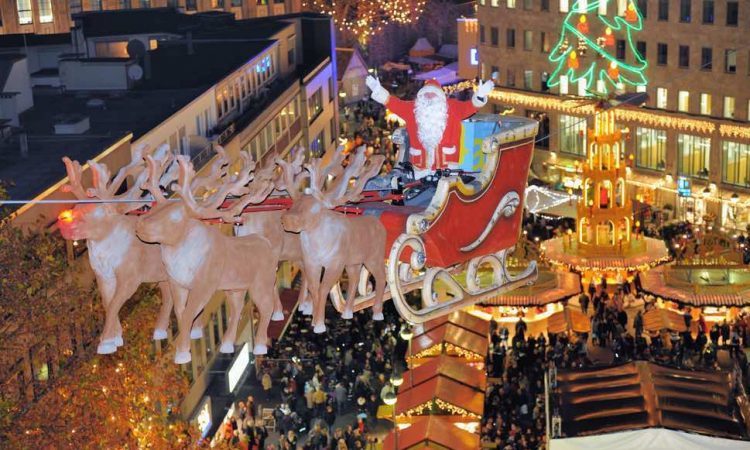 Flying Santa over Christmas Market